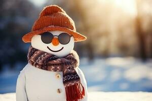 Cute fashionable snowman isolated on winter background photo