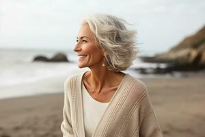 mature senior woman on beach coast  photo with empty space for text