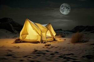 Tent with the moon shining in the night sky photo