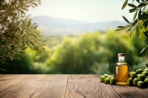 Old wooden product display table with natural green olive field and olive oil photo