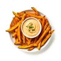 Sweet potato fries with sriracha mayo isolated on white background top view photo