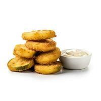 Fried pickles with aioli sauce isolated on white background side view photo