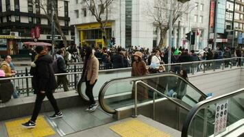 Istanbul, Turkey, January 14, 2023 People go out from Istanbul Kadikoy metro station on a winter day video