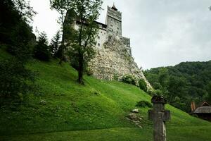 The Bran Castle in Romania. Dracula medieval castle in Carpathians, Transylvania. photo