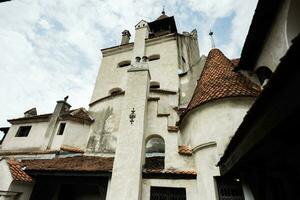 The Bran Castle in Romania. Dracula medieval castle in Carpathians, Transylvania. photo