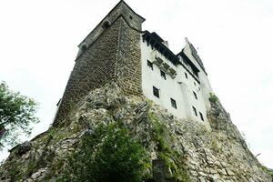 The Bran Castle in Romania. Dracula medieval castle in Carpathians, Transylvania. photo