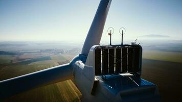 Aerial view of part of windmill turbine in countryside, Green energy photo