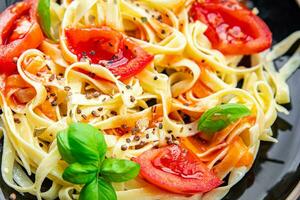 pasta tomato tagliatelle meal fresh food snack on the table copy space food background rustic top view photo