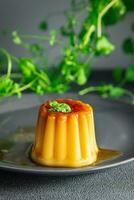 caramel flan sweet dessert jelly meal food snack on the table copy space food background rustic top view photo