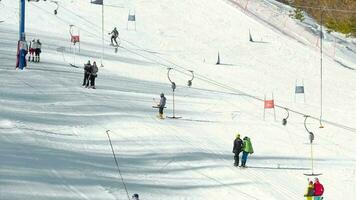 BELOKURIKHA, RUSSIAN FEDERATION FEBRUARY 22, 2017 - Unidentified tourists relax at the mountains ski resort Belokurikha video