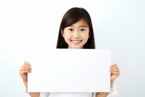 Happy asian scholl girl holding blank white banner sign, isolated studio portrait. AI Generated photo