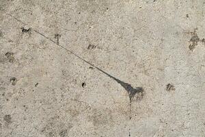 Cracked and abstract grunge texture. Aged material surface backdrop. Weathered effect pattern. Old and dirty background. photo
