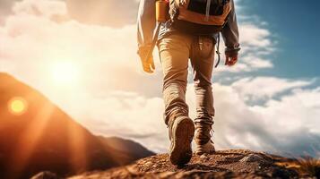 Hiking man with backpack hiking in the mountains. Hiking concept photo