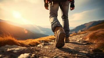 Hiking man with backpack hiking in the mountains. Hiking concept photo