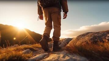 Hiking man with backpack hiking in the mountains. Hiking concept photo