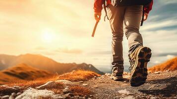 Hiking man with backpack hiking in the mountains. Hiking concept photo