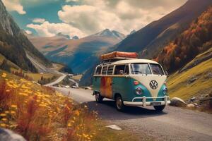 Vintage camper van on road in the mountains photo