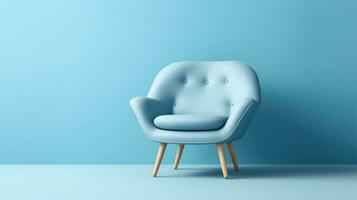 Blue armchair on blue background photo