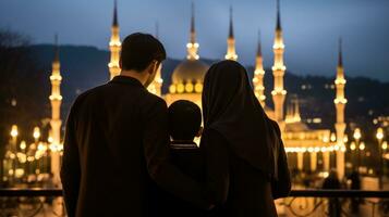 Muslim family view mosque. muslim family eid greetings back view, Jumma Mubarak photo