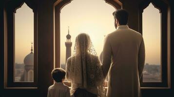 Muslim family view mosque. muslim family eid greetings back view, Jumma Mubarak photo