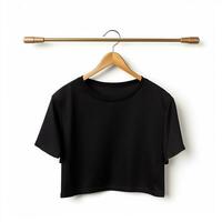 Black t-shirt on a hanger on a white background photo