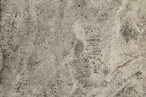 Cracked and abstract grunge texture. Aged material surface backdrop. Weathered effect pattern. Old and dirty background. photo