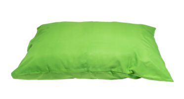 Green pillow after guest's use at hotel or resort room isolated with clipping path in png file format Concept of comfortable and happy sleep in daily life