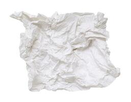 Single screwed or crumpled tissue paper or napkin in strange shape after use in toilet or restroom isolated on white background with clipping path. photo