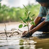 restaurar el línea costera comunidad compromiso en plantando manglares para ambiente conservación y habitat restauracion en tierra día, promoviendo sostenibilidad. tierra día generativo ai foto