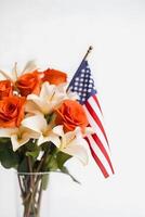 Patriotic Blooms Vibrant American Flag Color Flowers on a White Background with Copy Space photo