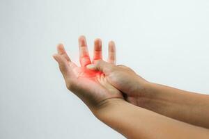 A male patient suffering from joint, finger pain and numbness, depicting a medical symptom, against a white background. photo