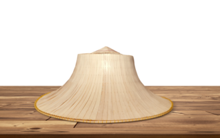 Thai farmer's straw hat on wooden table PNG transparent