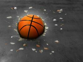 The basketball penetrates the cement surface with great power. photo