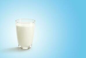 Glass of milk on blue white background photo