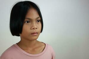 Portrait of child on the grey background photo