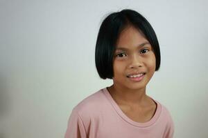 Portrait of child on the grey background photo