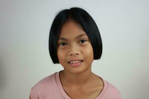 Portrait of child on the grey background photo