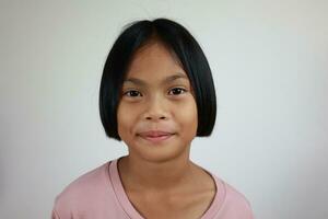 Portrait of child on the grey background photo