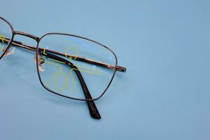 Glasses are placed on the table in the ophthalmologist. photo