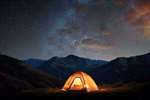 Illuminated camp tent under a view of the mountains and a starry sky. Generative AI photo