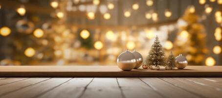 Christmas decorations on wooden floor, lights with bokeh effect in the background. photo