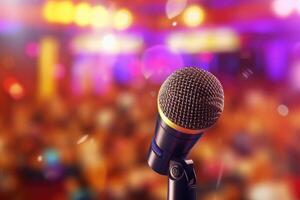 A photograph with the microphone in focus above the lecture hall lectern. photo