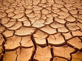 seco agrietado tierra en un desierto, en el estilo de terracota, ambiental conciencia. generativo ai foto