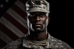 American soldier in uniform standing tall and saluting, with the American flag in the background. photo