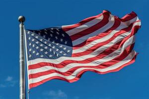 A powerful image of an American flag waving proudly in the wind against a clear blue sky. Generative AI photo