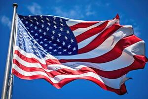 A powerful image of an American flag waving proudly in the wind against a clear blue sky. Generative AI photo