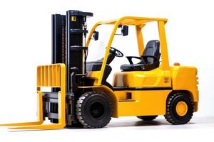 A close - up shot of a yellow forklift isolated on a white background. photo