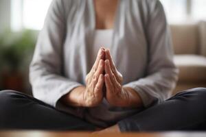 A close - up shot of someone practicing mindfulness meditation, focusing on their hands. photo