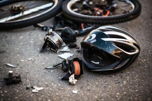 A image by capturing the aftermath of a bicycle crash on a city road. photo