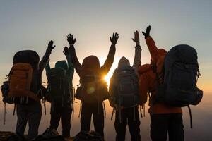 A close - up of the hikers' backpacks and hands. photo